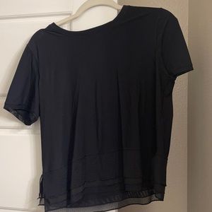 Black Lululemon crop top with detailed bottom